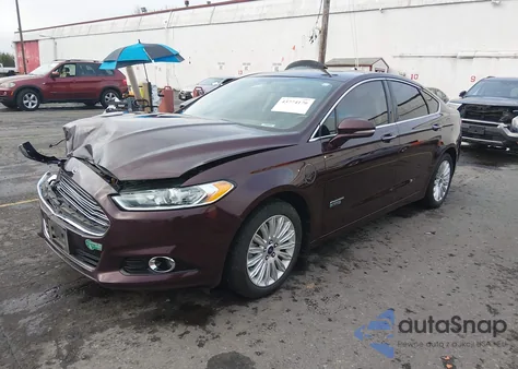 2013 Ford Fusion Energi Titanium from USA, damaged, VIN 3FA6P0SU2DR325914